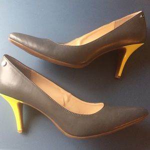 Grey leather heels with neon yellow patent heel